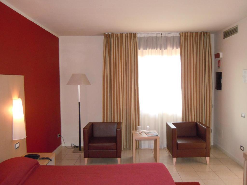 Blue Relais Garda Hotel Carpenedolo Quarto foto